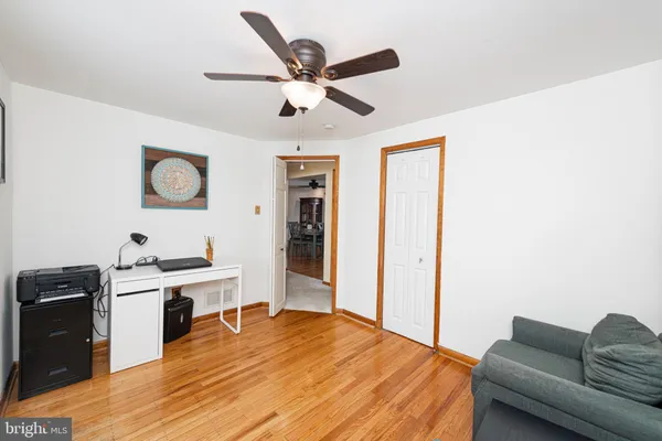 a bed room with a bed and a television