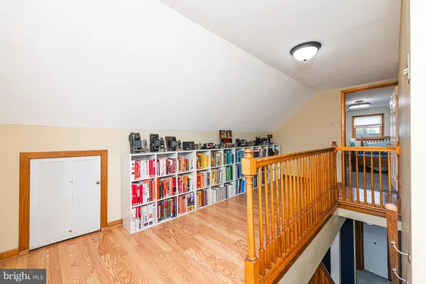 a view of a hallway with windows