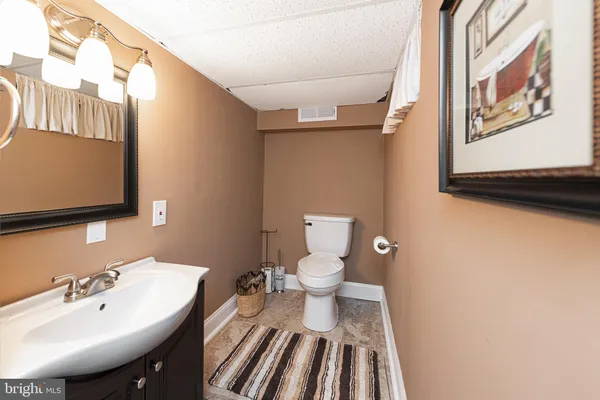 a dining table with chairs and wooden floor