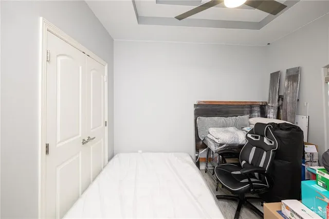 a bedroom with a bed and furniture