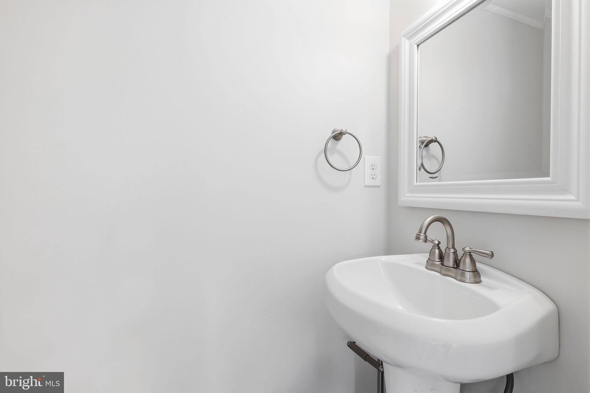 3906 Boxwood Road Jarrettsville, MD 21084 - Photo 15 of 36 Sleek and modern powder room design.