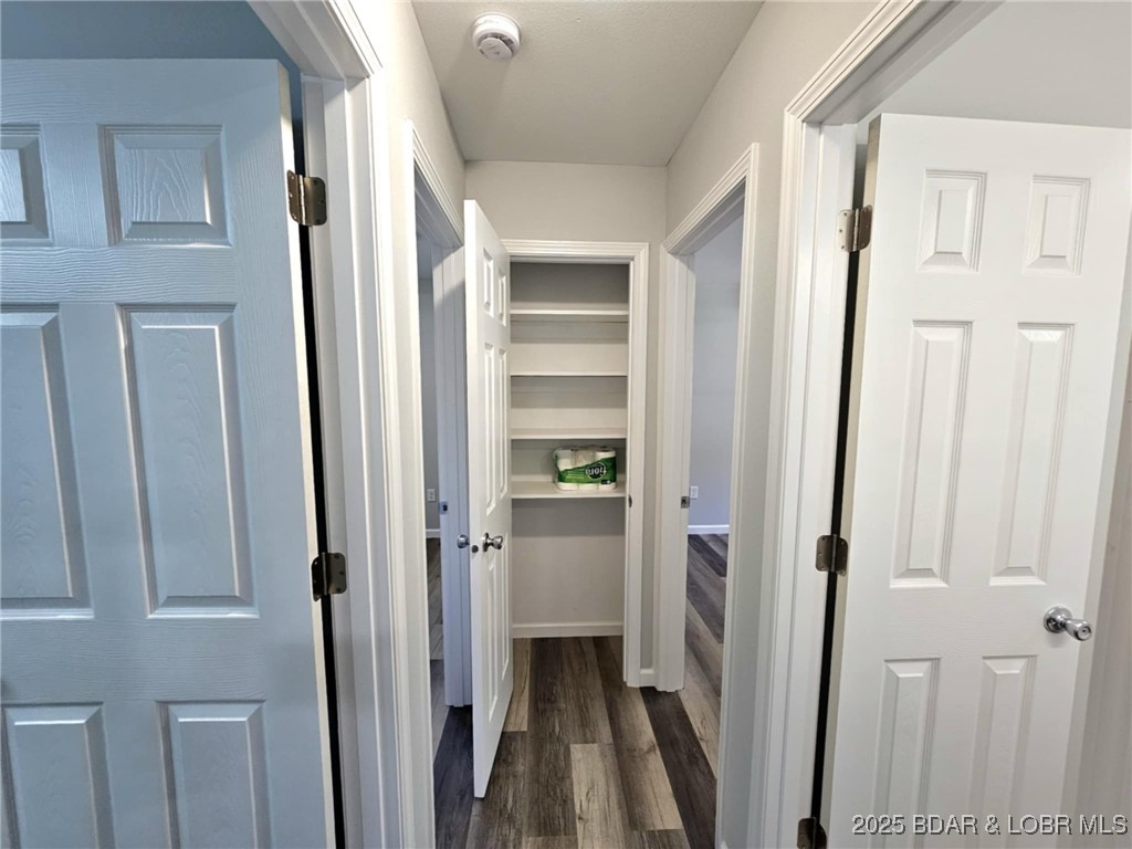 4861 University Lane Osage Beach, MO 65065 - Photo 18 of 31 Hallway with linen closet