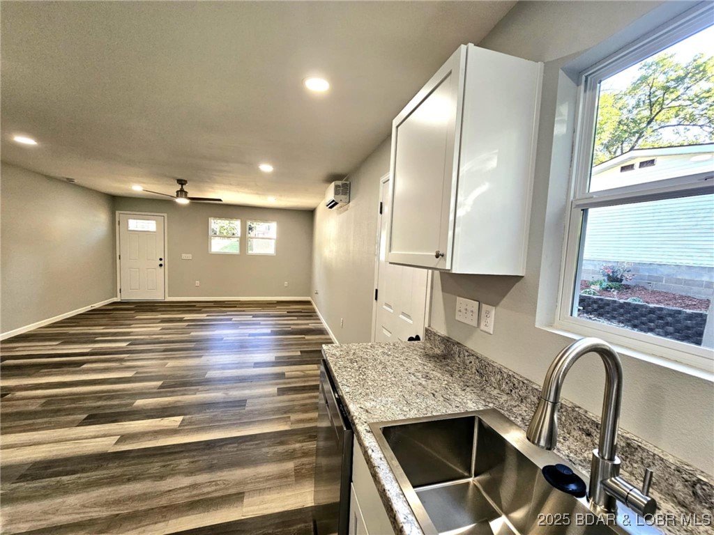 4861 University Lane Osage Beach, MO 65065 - Photo 7 of 31 Open living and kitchen area.