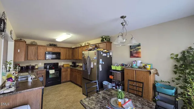a bathroom with a sink vanity and a mirror