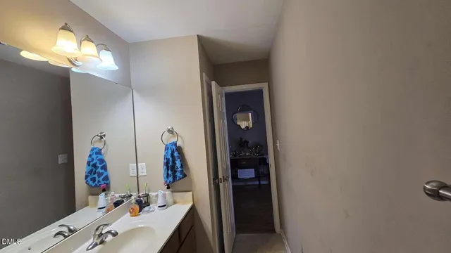 a bathroom with a mirror