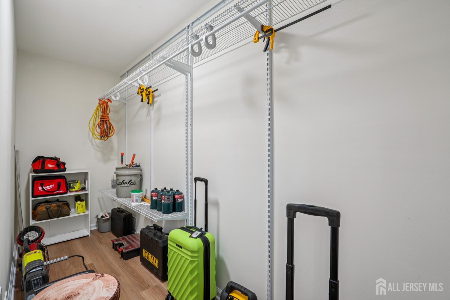 12 Brookville Road Edison, NJ 08817 - Photo 12 of 25 a living room with furniture a rug and a wall painting