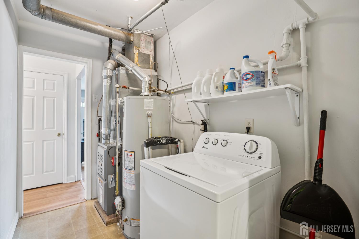 12 Brookville Road Edison, NJ 08817 - Photo 21 of 25 a utility room with dryer and washer