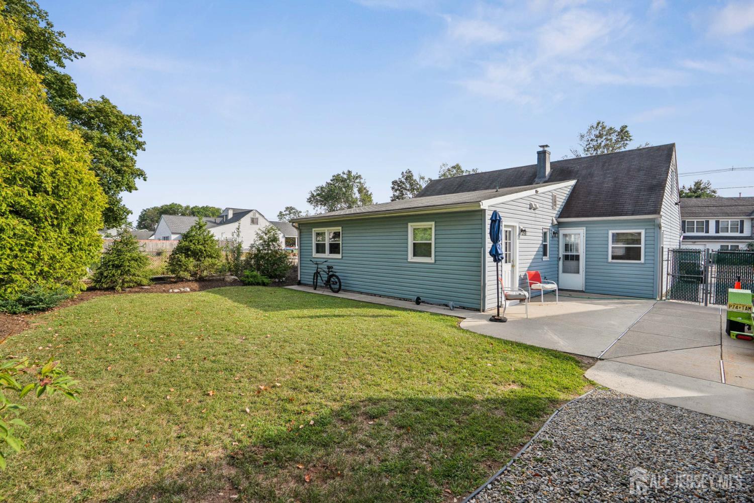 12 Brookville Road Edison, NJ 08817 - Photo 25 of 25 a front view of a house with a yard and garage