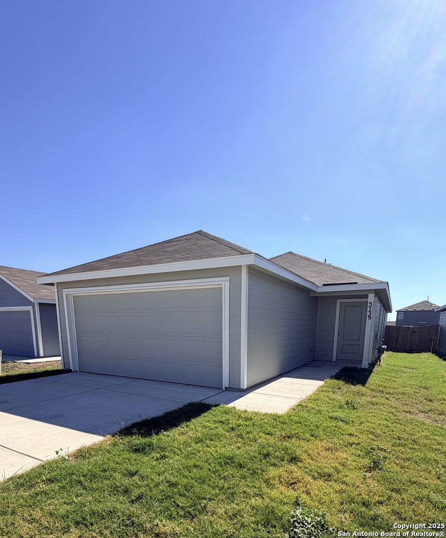 5739 Alope Seguin, TX 78155 - Photo 1 of 1 a front view of house with yard