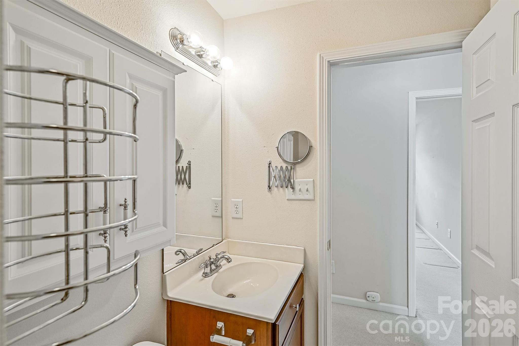 4160 Segundo Lane Fort Mill, SC 29707 - Photo 25 of 30 a bathroom with a sink and a mirror