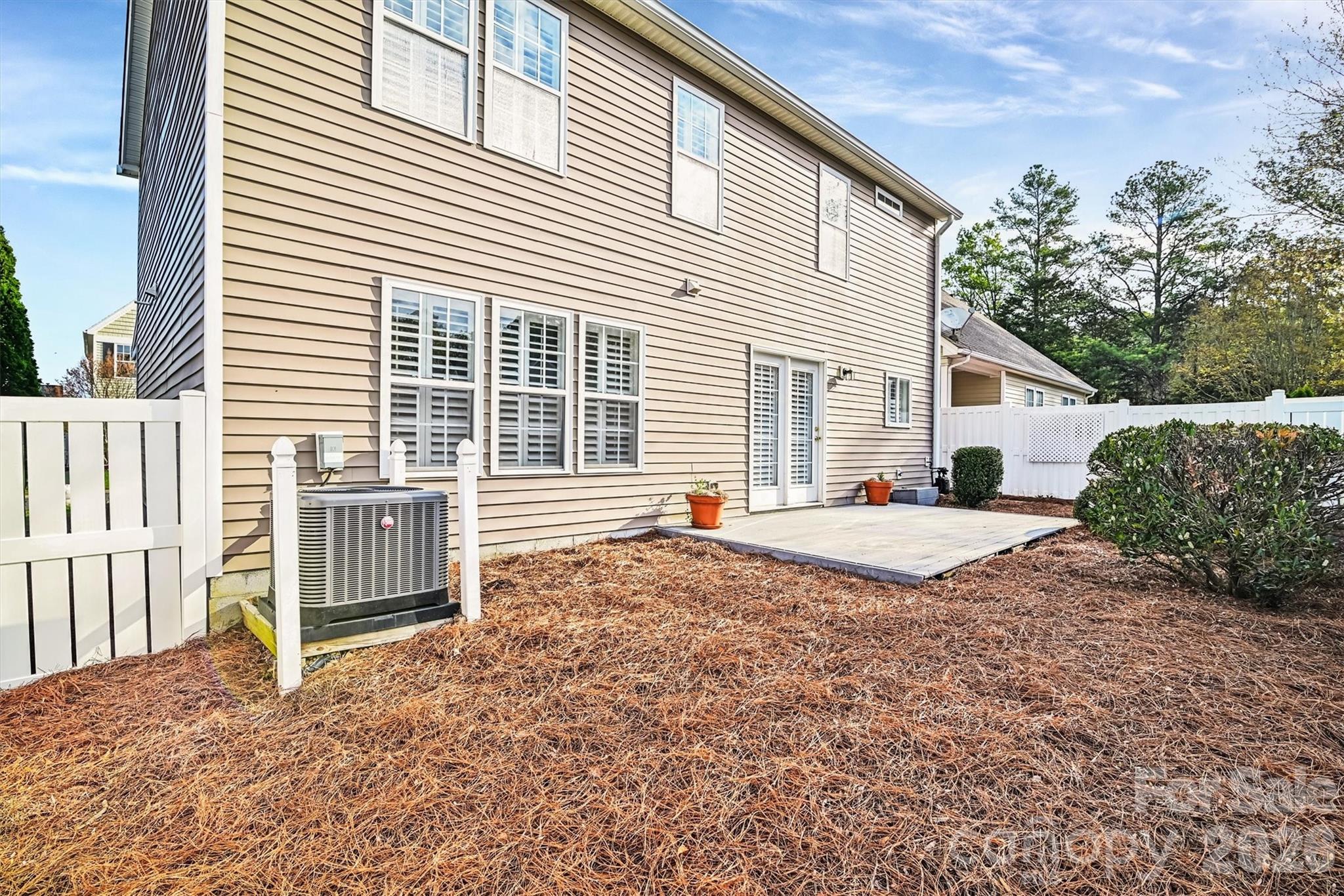 4160 Segundo Lane Fort Mill, SC 29707 - Photo 29 of 30 a view of a house with a backyard and a porch