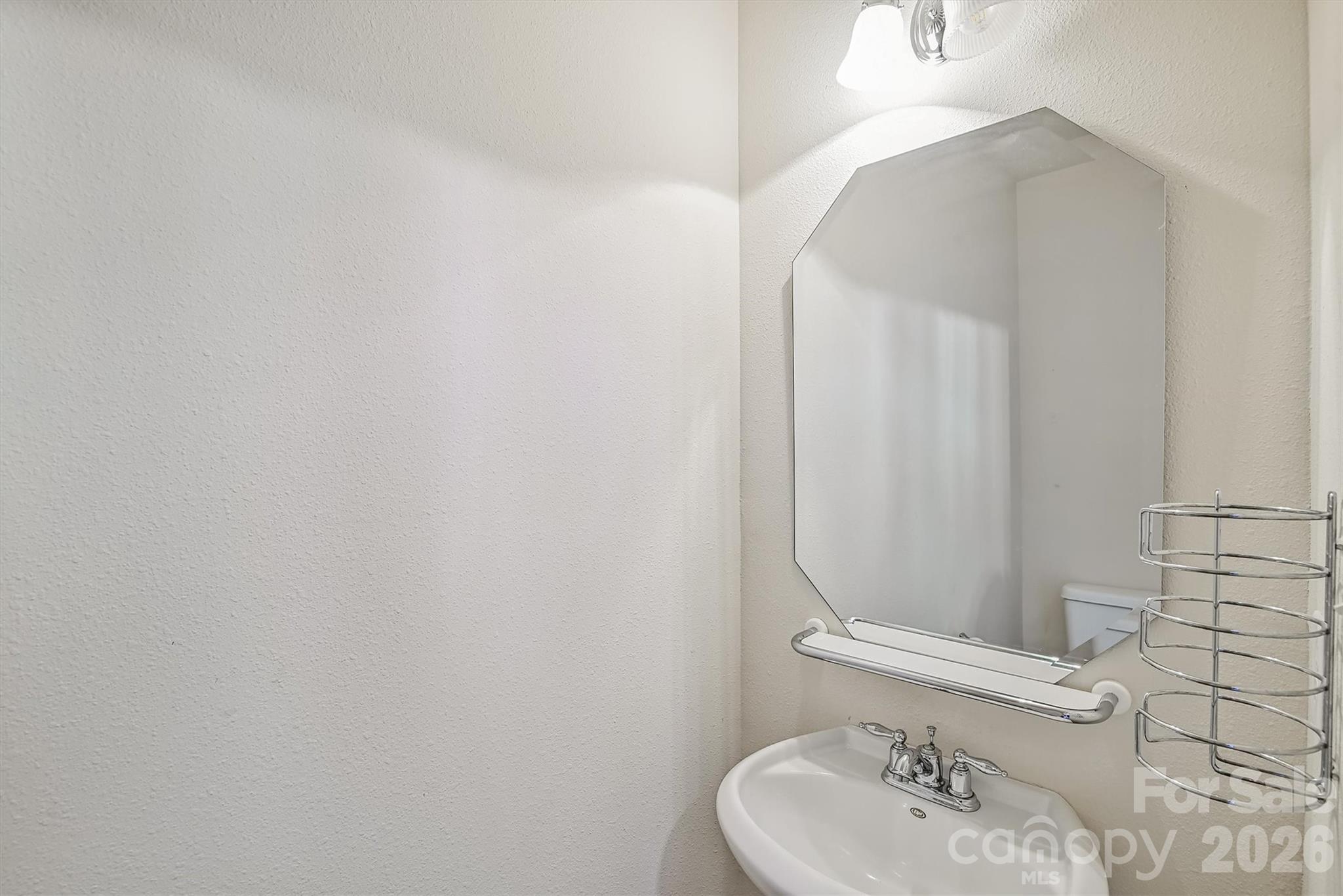 4160 Segundo Lane Fort Mill, SC 29707 - Photo 7 of 30 a bathroom with a sink and a mirror