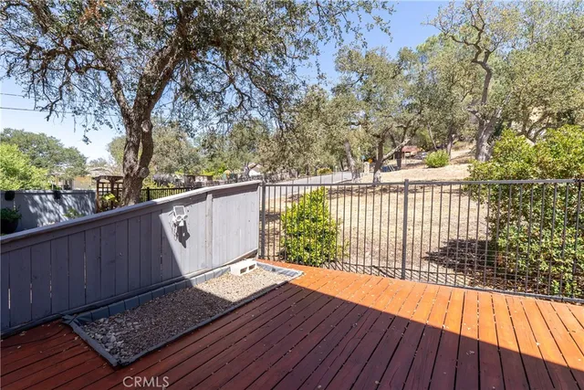 a balcony view with a seating space