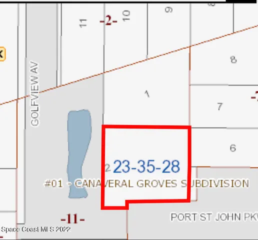 a view of a garden with an outdoor seating