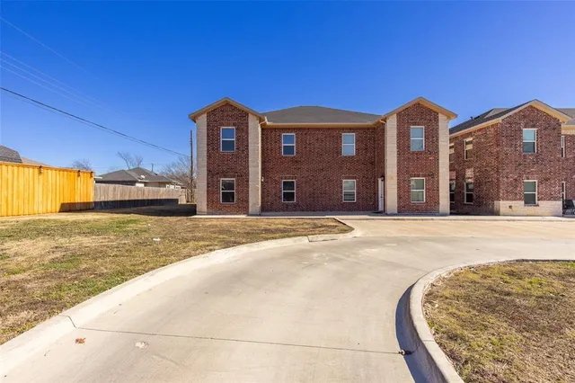 a view of a house with a swimming pool