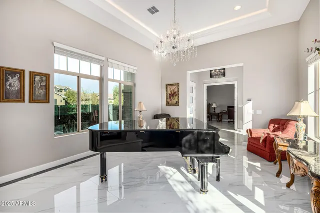 a bedroom with a bed window and a potted plant