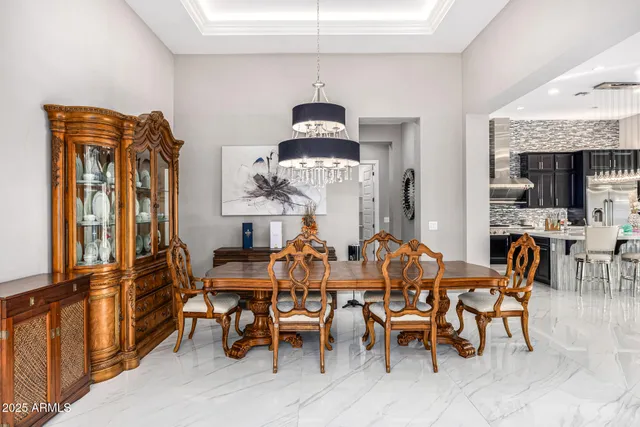 a bathroom with a sink toilet and a mirror