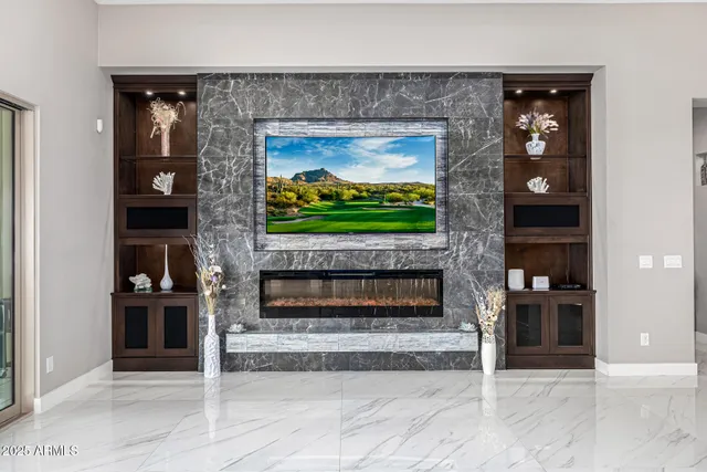 a spacious bathroom with a double vanity sink a toilet and a mirror