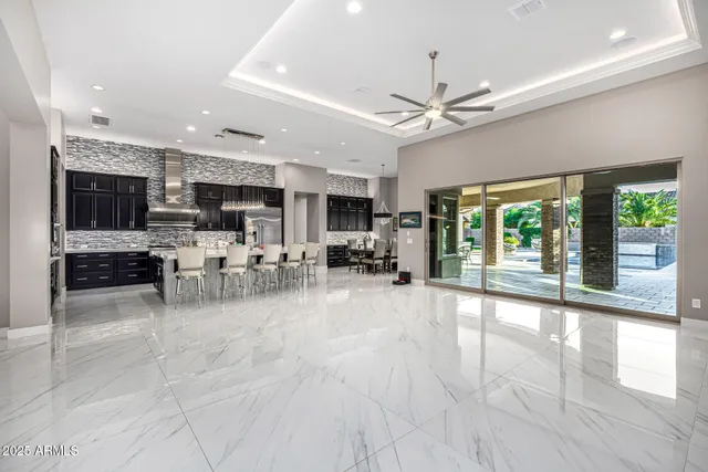 a view of a house with a yard porch and sitting area