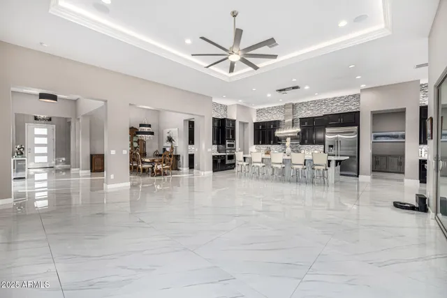 a view of parking garage with cars parked