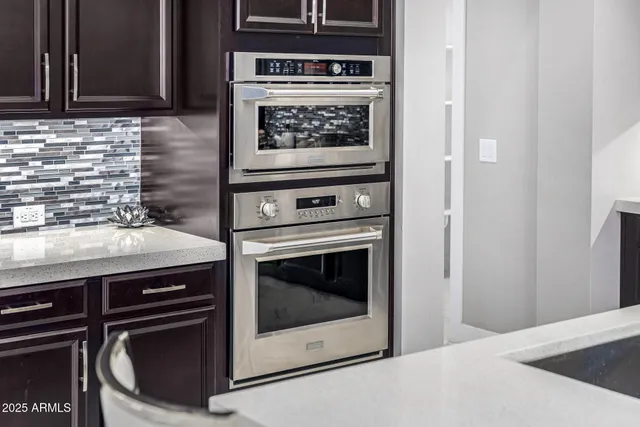 an aerial view of residential building and ocean