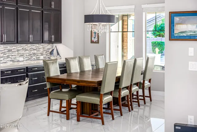 an aerial view of residential houses and wooden fence