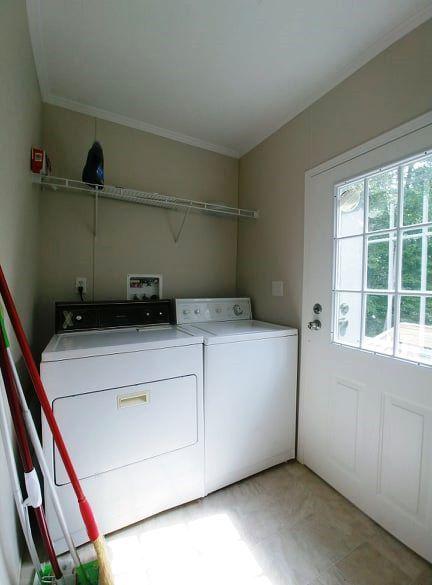 180 Factory Hill Road Callaway, VA 24067 - Photo 11 of 14 a utility room with dryer and washer