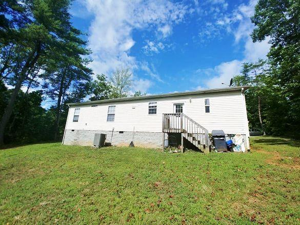 180 Factory Hill Road Callaway, VA 24067 - Photo 13 of 14 an outdoor view of house with backyard