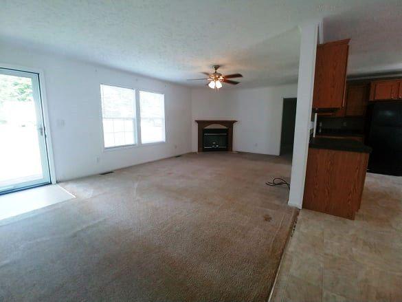 180 Factory Hill Road Callaway, VA 24067 - Photo 4 of 14 an empty room with windows