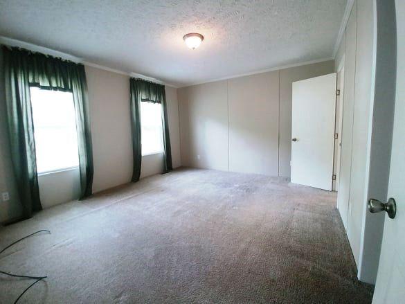 180 Factory Hill Road Callaway, VA 24067 - Photo 5 of 14 a view of an empty room with a window