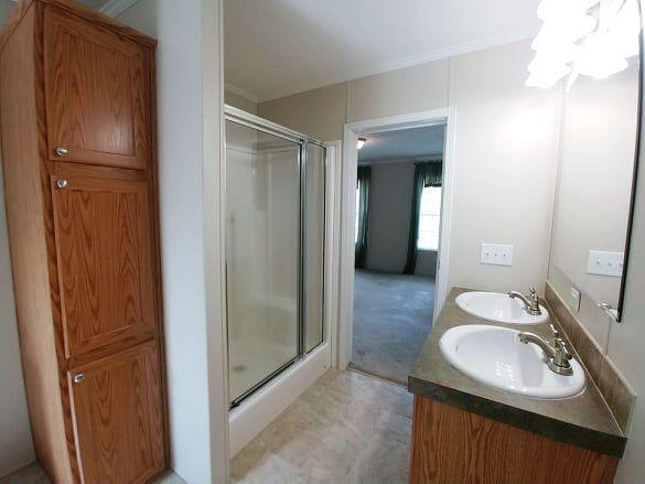 180 Factory Hill Road Callaway, VA 24067 - Photo 6 of 14 a bathroom with a sink a toilet and shower