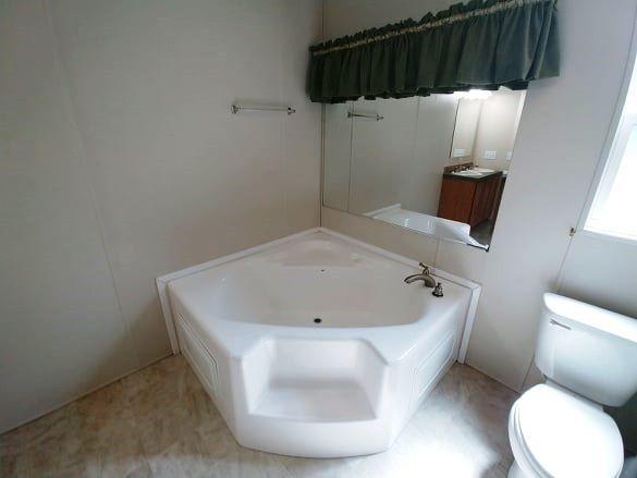 180 Factory Hill Road Callaway, VA 24067 - Photo 7 of 14 a bathroom with a sink and a toilet
