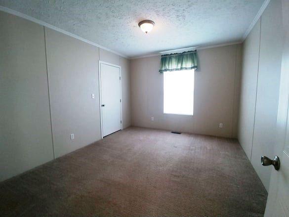 180 Factory Hill Road Callaway, VA 24067 - Photo 8 of 14 an empty room with windows