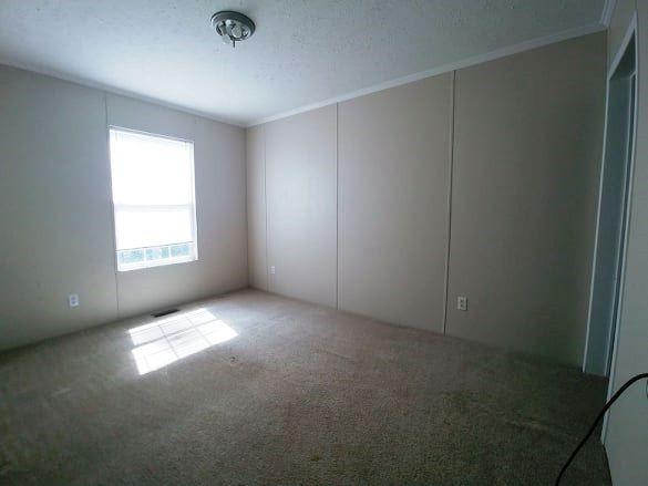 180 Factory Hill Road Callaway, VA 24067 - Photo 10 of 14 a view of an empty room and window