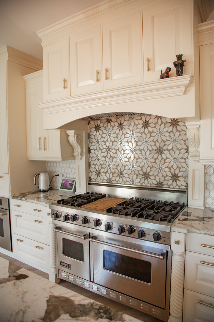 28W130 Roosevelt Road Winfield, IL 60190 - Photo 16 of 54 a stove top oven sitting inside of a kitchen