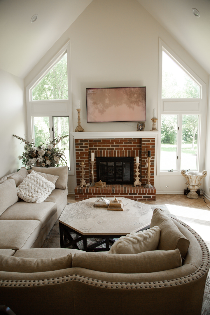 28W130 Roosevelt Road Winfield, IL 60190 - Photo 24 of 54 a living room with furniture and a fireplace