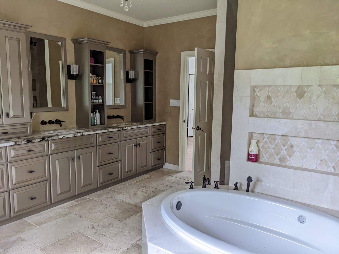 28W130 Roosevelt Road Winfield, IL 60190 - Photo 40 of 54 a bathroom with a tub sink and mirror