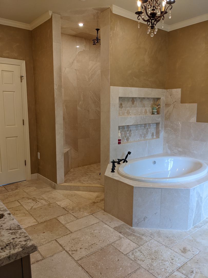 28W130 Roosevelt Road Winfield, IL 60190 - Photo 43 of 54 a view of a bathtub in a bathroom