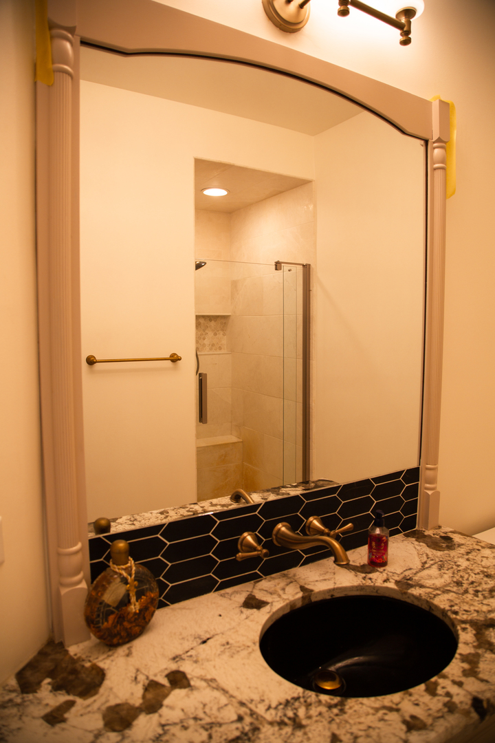 28W130 Roosevelt Road Winfield, IL 60190 - Photo 44 of 54 a bathroom with a sink and a mirror
