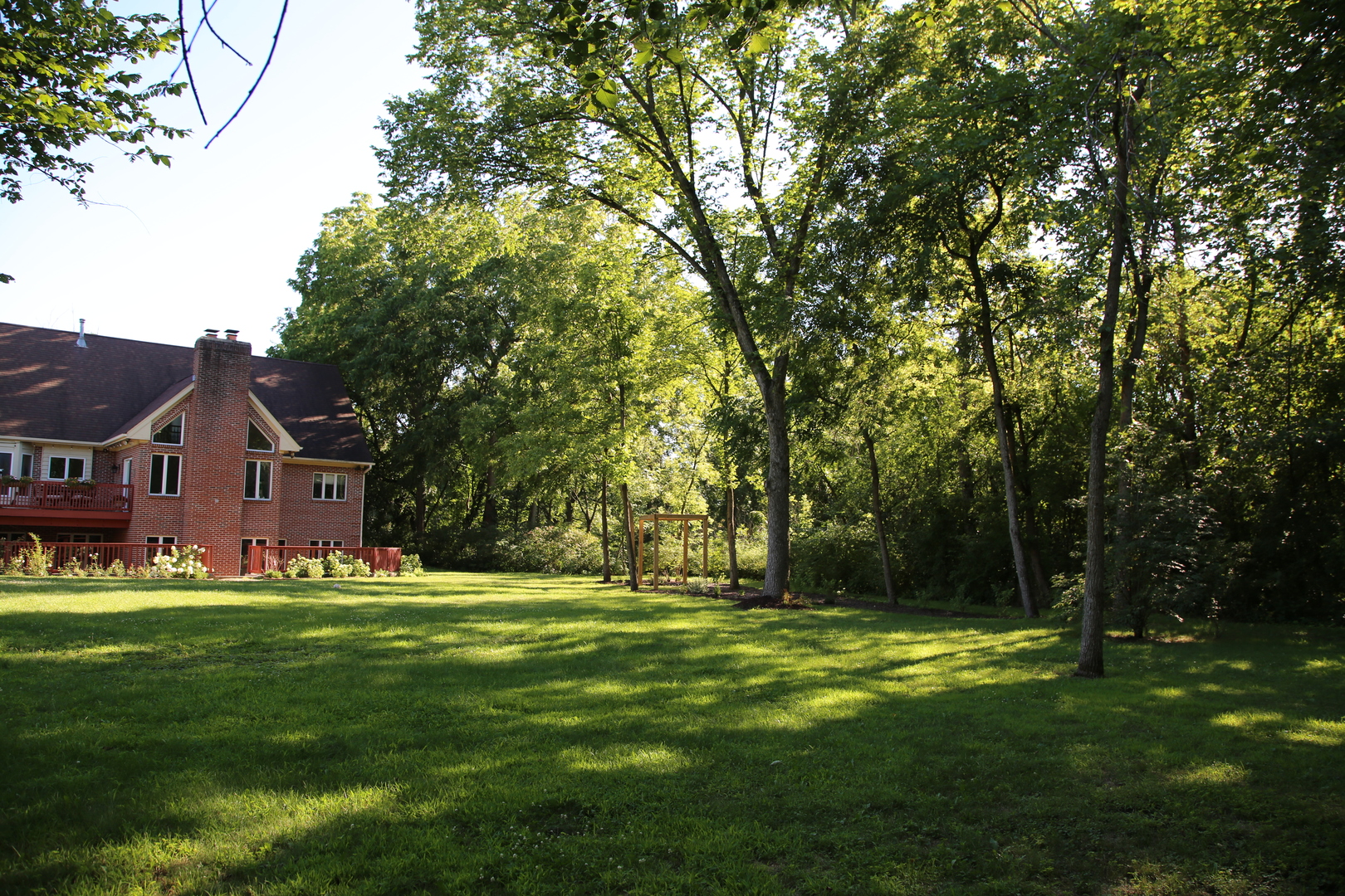 28W130 Roosevelt Road Winfield, IL 60190 - Photo 7 of 54 a view of a house with a big yard