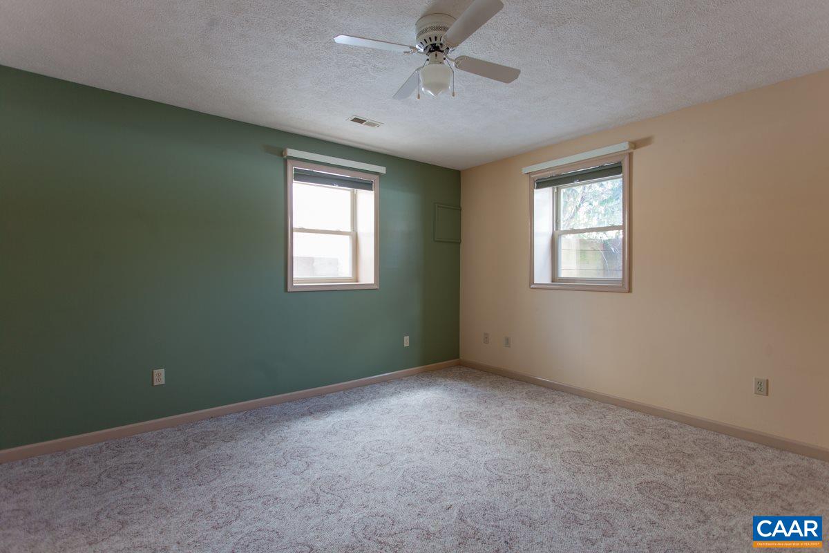 1 James River Road Palmyra, VA 22963 - Photo 24 of 33 an empty room with a window and a fan