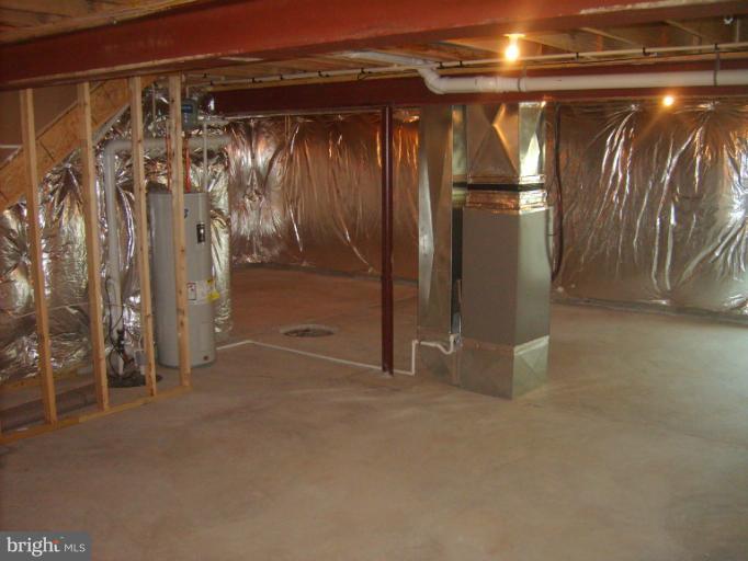 7720 North Point Road Edgemere, MD 21219 - Photo 14 of 22 a view of water heater room