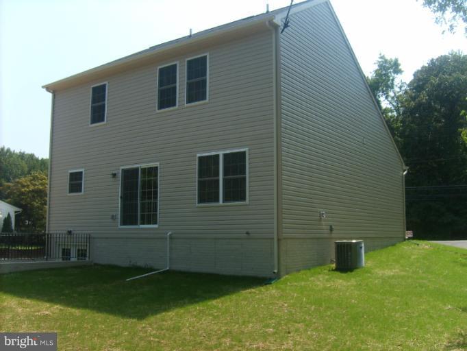 7720 North Point Road Edgemere, MD 21219 - Photo 15 of 22 a view of a backyard of the house