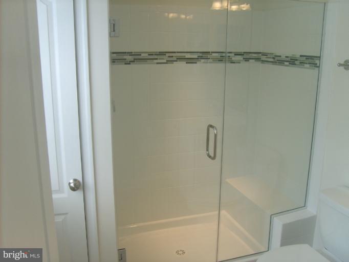 7720 North Point Road Edgemere, MD 21219 - Photo 18 of 22 a bathroom with a shower