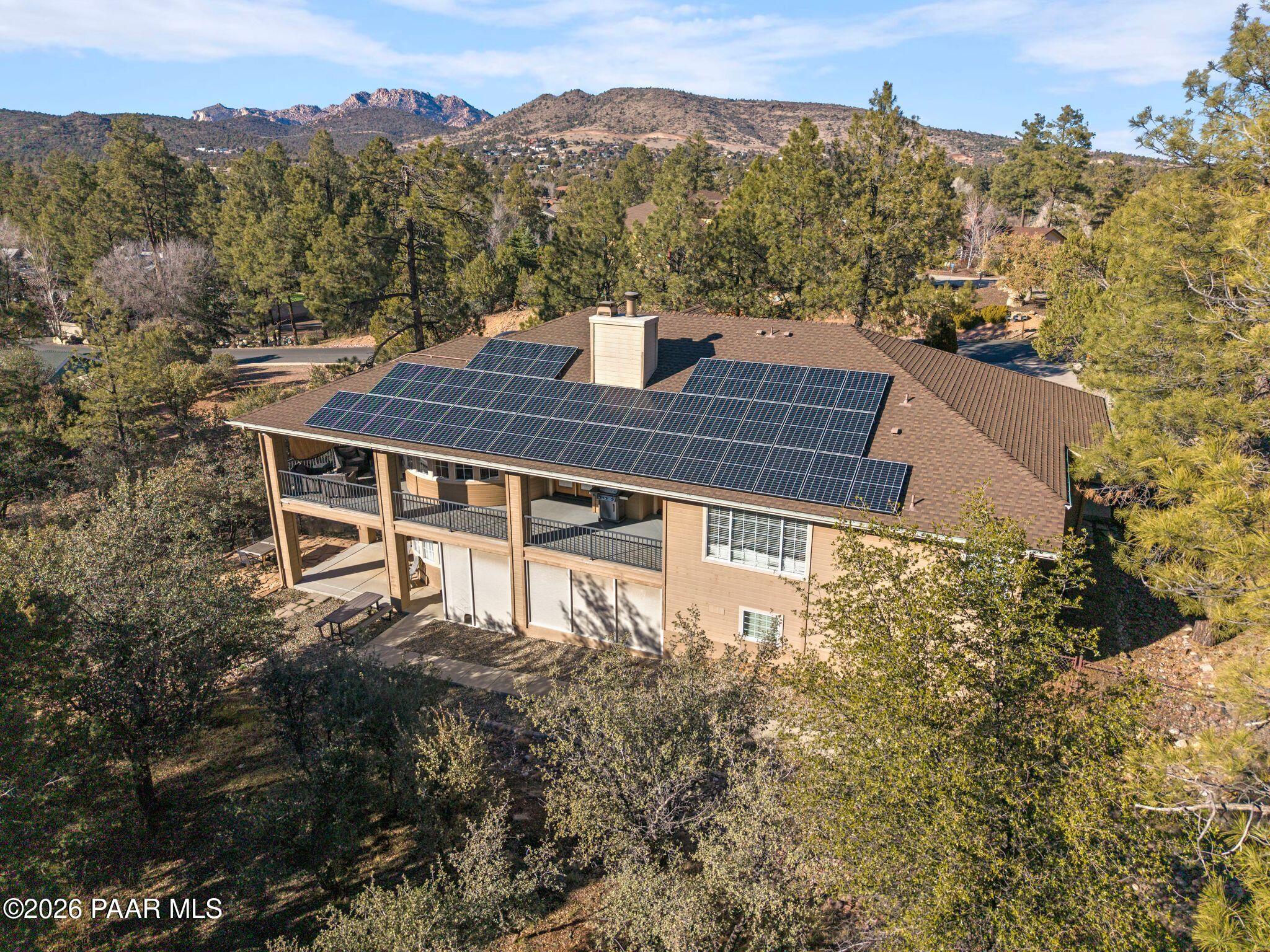 2015 Shadow Valley Ranch Road Prescott, AZ 86305 - Photo 37 of 42 a view of a large house with a mountain