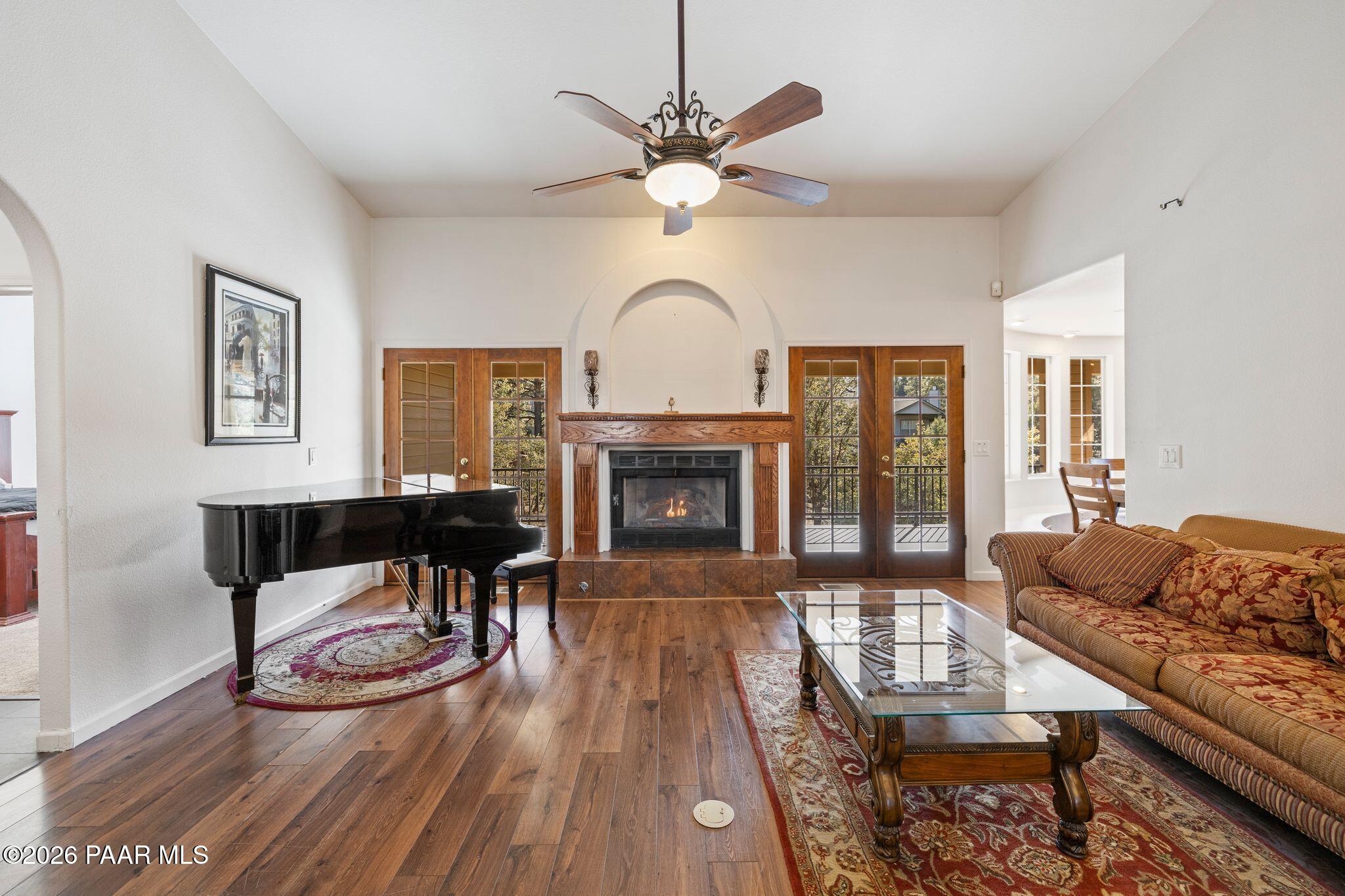 2015 Shadow Valley Ranch Road Prescott, AZ 86305 - Photo 6 of 42 a living room with furniture and a fireplace