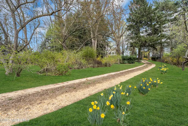 a view of a porch with wooden floor and stairs