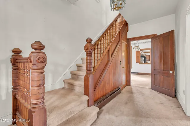 a kitchen with stainless steel appliances granite countertop a stove and a sink