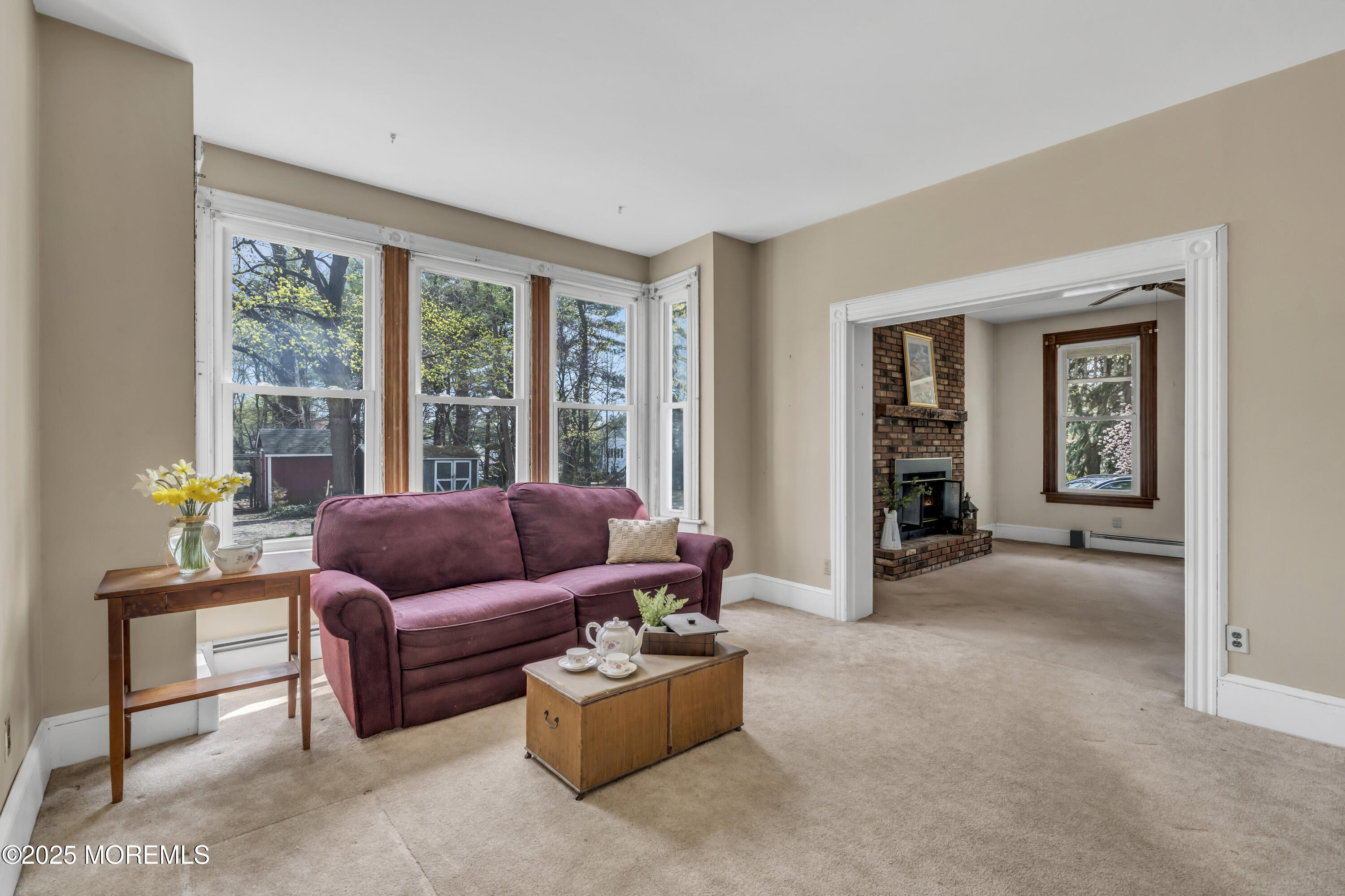 627 Beers Street Hazlet, NJ 07730 - Photo 21 of 64 a living room with furniture and a window