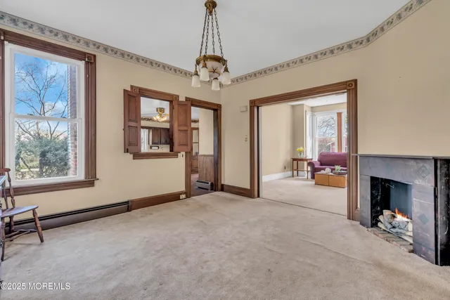 a view of livingroom with hardwood floor and a ceiling fan